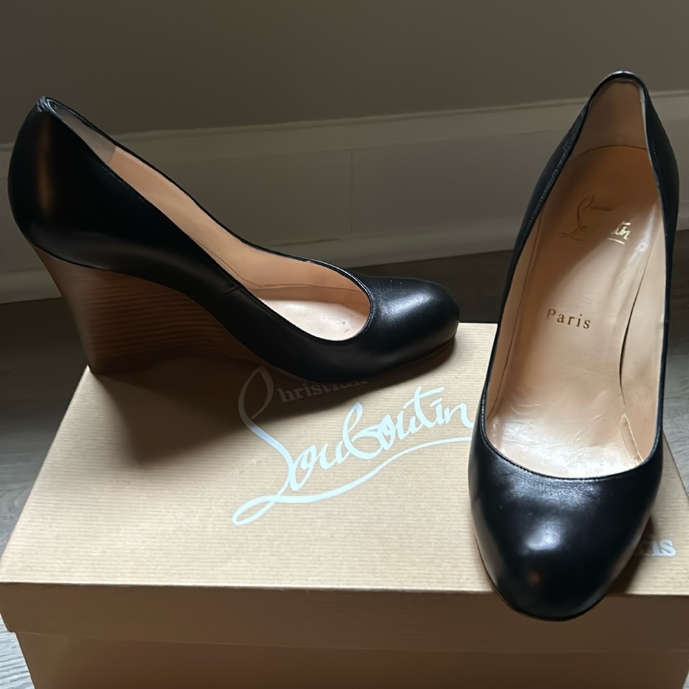 Christian Louboutin size 6.5 wedge closed toe shoe